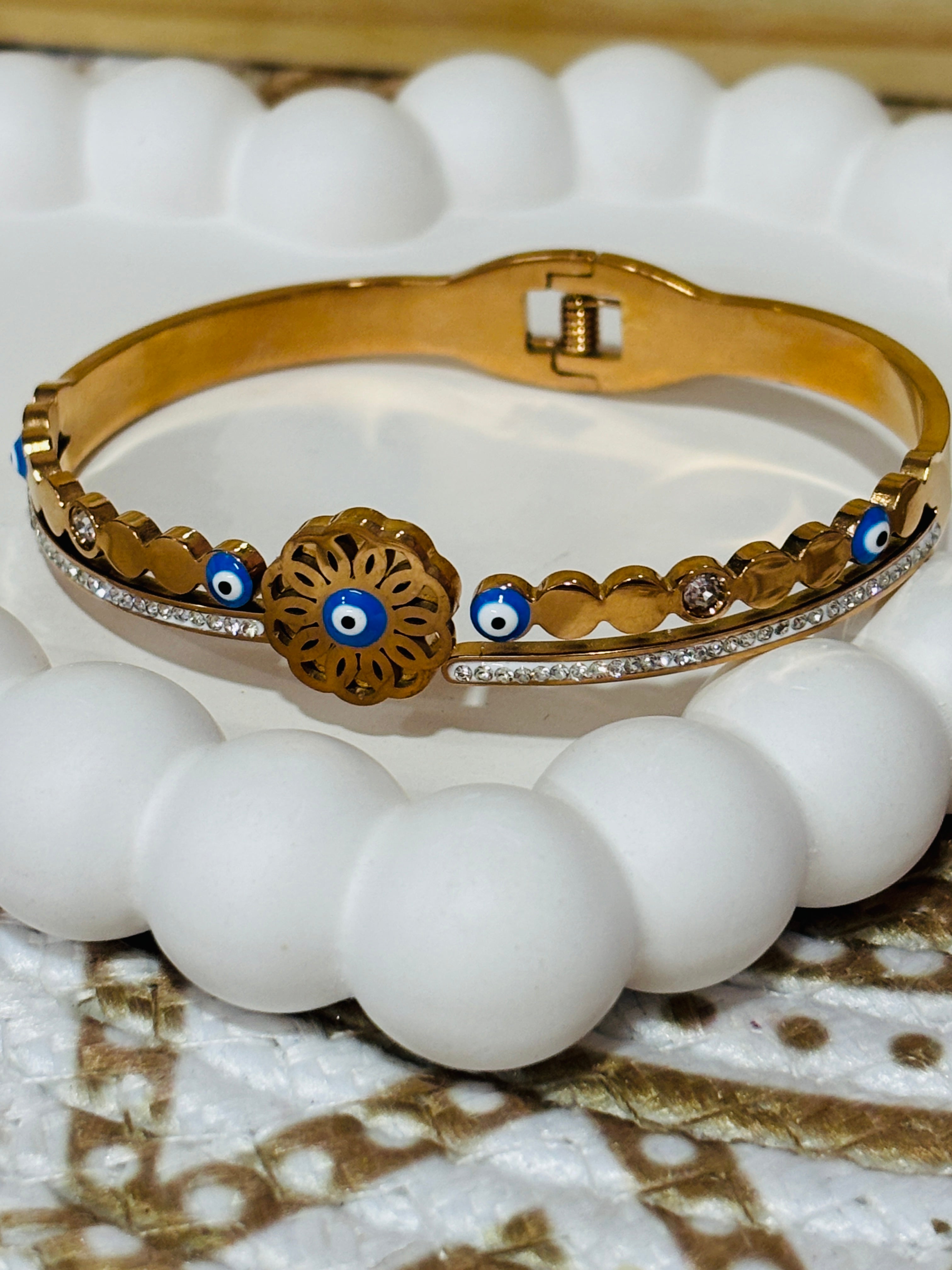 Floral evil eye diamond studded bracelet